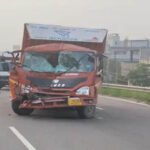 Police inspecting the damaged truck and the spot in the accident.
